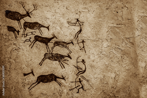 Cave art seamless pattern made of ancient wild animals, horses and hunters. Rock paintings. Hunting scenes. palaeolithic Petroglyphs carved in rocks. Stones with petroglyphs. people get food photo