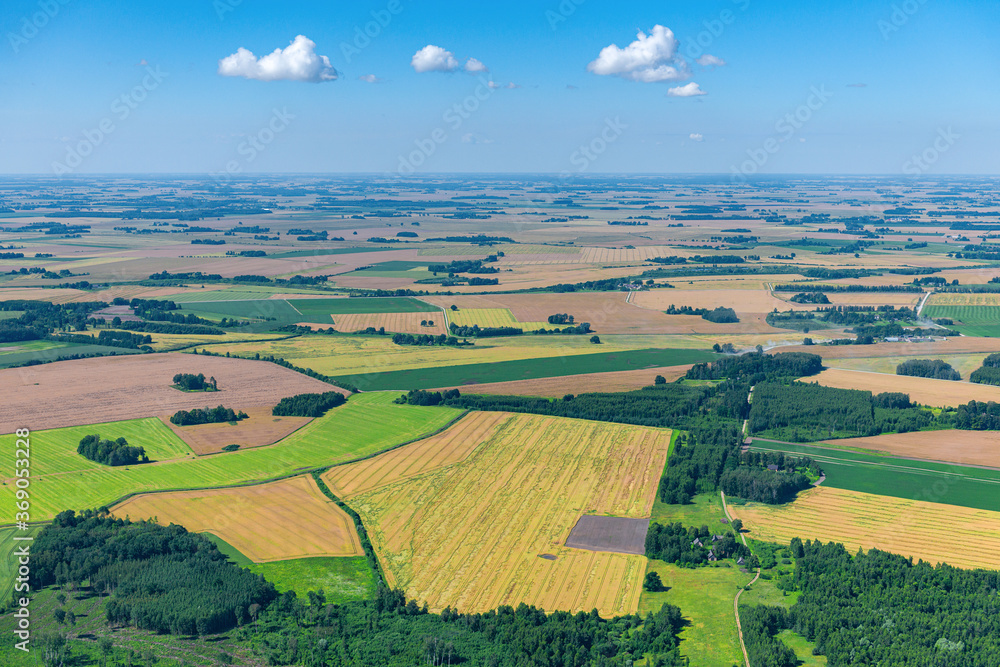 aerial view over the rural fields in summer season