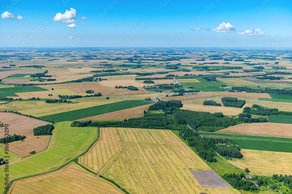 aerial view over the rural fields in summer season aerial view over the rural fields in summer season