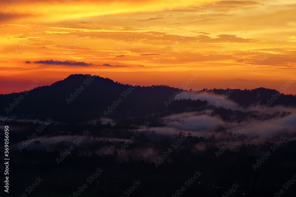 Sunset over mountain at Thung Salaeng Luang National Park
