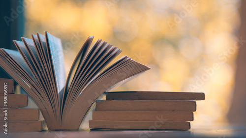 open book on wooden table