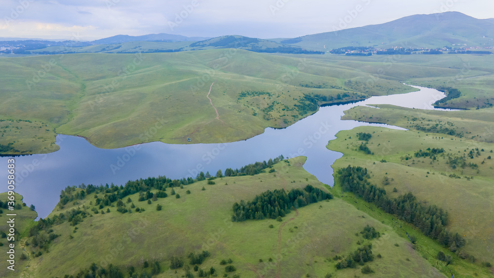 Aerial view of water and meadow