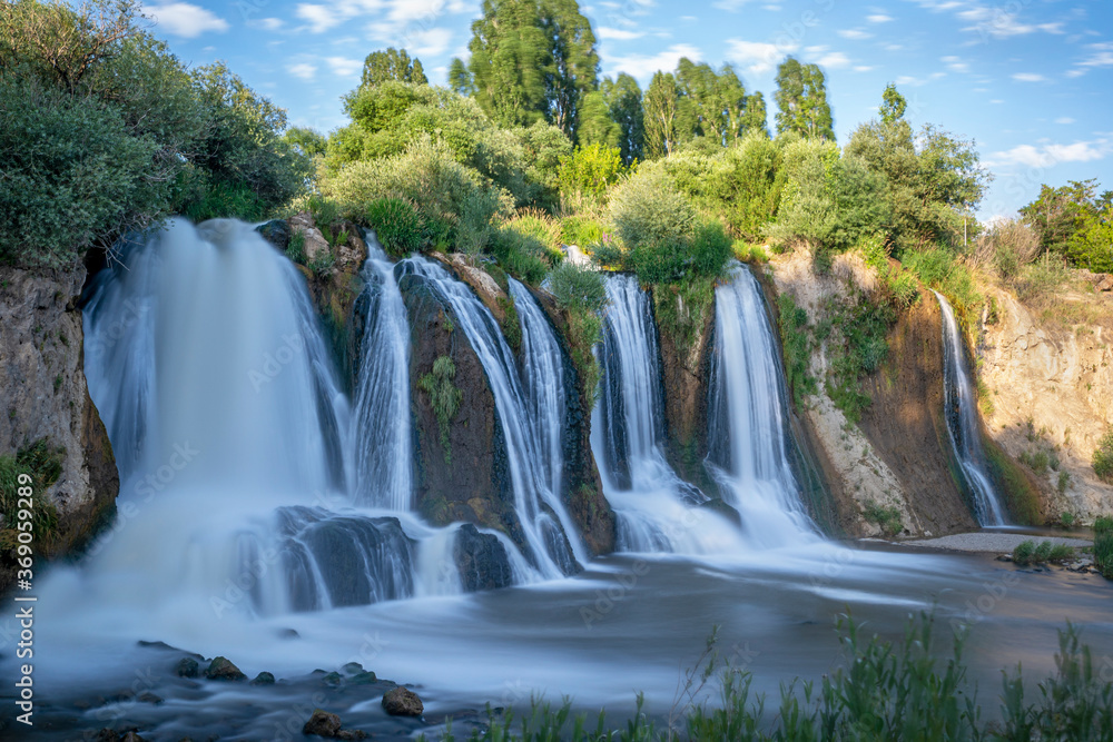 Muradiye waterfall, which is located on the Van - Dogubeyazit highway, a natural wonder often visited by tourists in Van, Turkey Muradiye waterfall, which is located on the Van - Dogubeyazit highway, a natural wonder often visited by tourists in Van, Turkey
