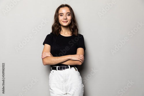 Fotografering Portrait of beautiful brunette woman on grey background