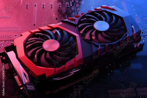 Cuadro en lienzo Computer game graphics card, videocard with two coolers on circuit board ,motherboard background