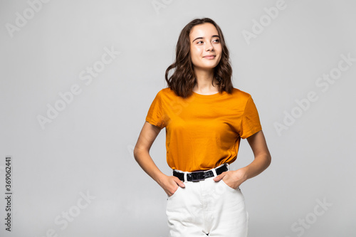 Wallpaper Mural Portrait of beautiful young woman standing on grey background Torontodigital.ca