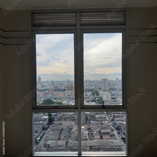 View from the window of a building. Window. View of Bangkok City.