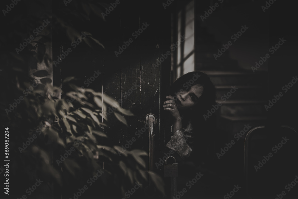 Portrait of asian woman make up ghost face with blood,Horror scene,Scary background,Halloween poster,Thailand people,Ghost movies poster Portrait of asian woman make up ghost face with blood,Horror scene,Scary background,Halloween poster,Thailand people,Ghost movies poster