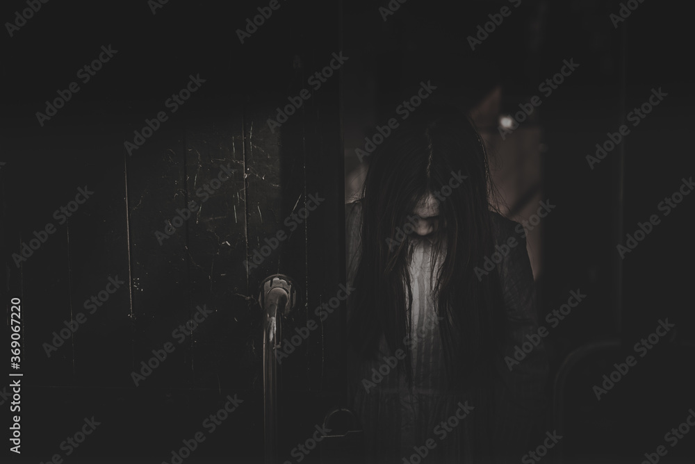 Portrait of asian woman make up ghost face with blood,Horror scene,Scary background,Halloween poster,Thailand people,Ghost movies poster Portrait of asian woman make up ghost face with blood,Horror scene,Scary background,Halloween poster,Thailand people,Ghost movies poster