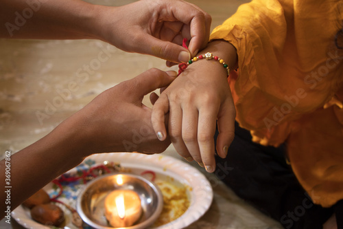 Indian festival: A traditional Indian wrist band which is a symbol of love between Brother and Siste photo