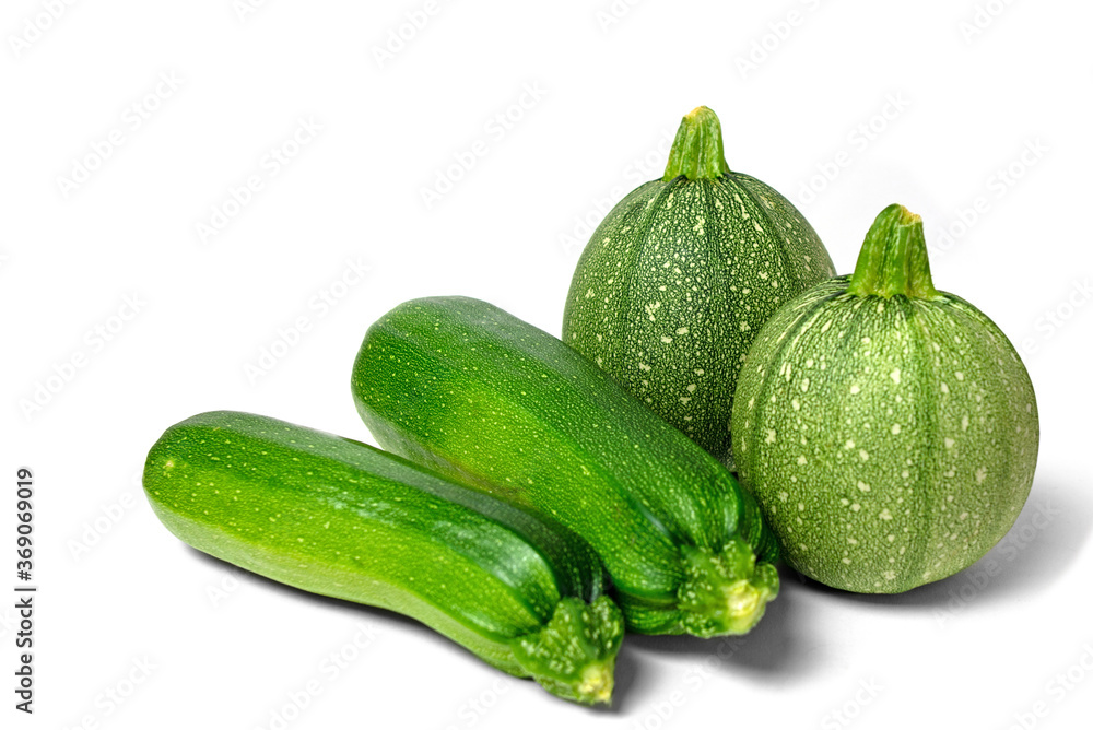 eine Gruppe runde und lange Zucchinis, eine Gruppe runde und lange Zucchinis,