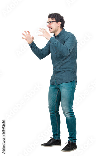 Angry businessman, boss reacting furious to his employees work, clenching teeth and hands. Irritated and annoyed guy negative facial expression, blaming or scolding isolated on white background. photo