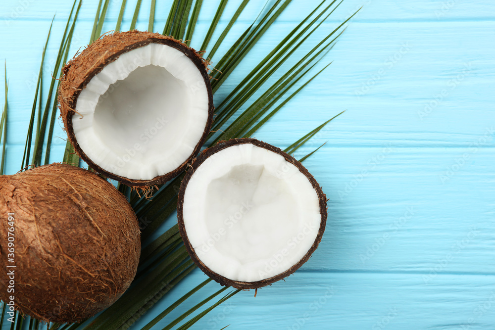 broken coconut on a colored background.
broken coconut on a colored background.