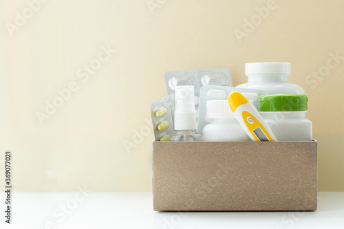 Image of a box of compounded prescription medications shipped from a mail order pharmacy on a lihgt background.