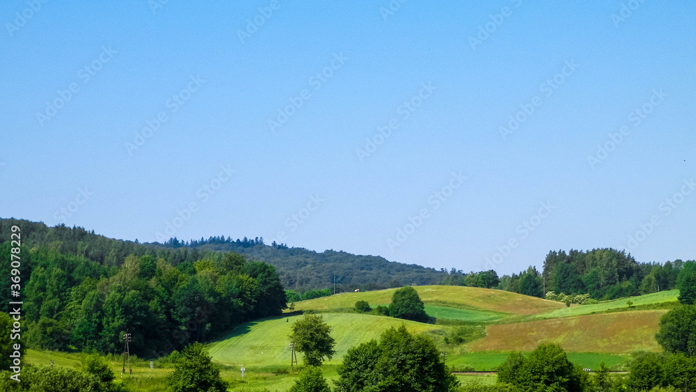 Obraz premium Hills, fields and meadows - beautiful landscape of Wiezyca.