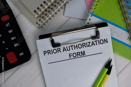 Fotografija Prior Authorization Form write on paperwork isolated on office desk