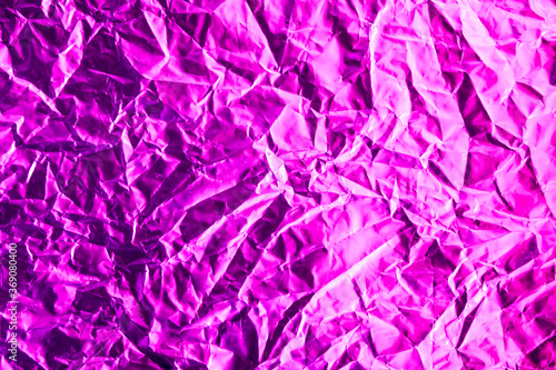 Shiny purple foil texture background, violet aluminium 