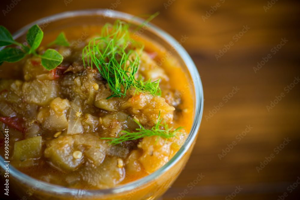 Eggplant caviar in the rustic bowl closeup Eggplant caviar in the rustic bowl closeup