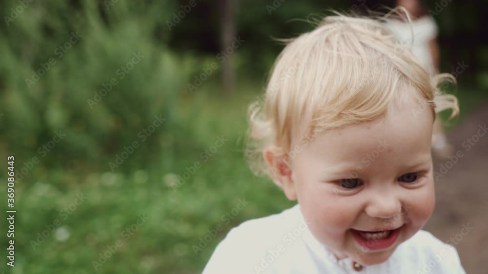 close-up child portrait, running child in park, healthy lifestyle concept, free movement and child happiness. close-up child portrait, running child in park, healthy lifestyle concept, free movement and child happiness.