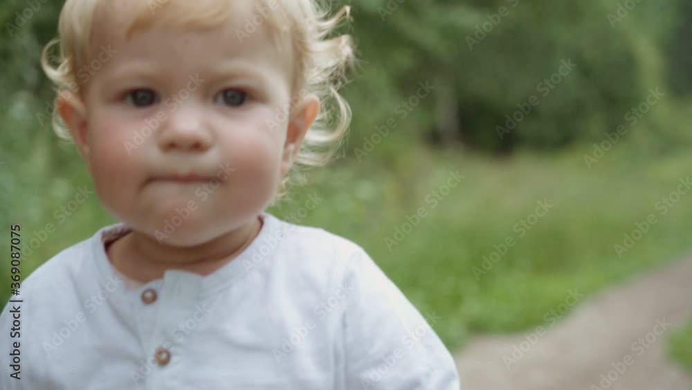 portrait of a child in the park. crying baby . parenting concept. childish tantrum and disobedience. portrait of a child in the park. crying baby . parenting concept. childish tantrum and disobedience.