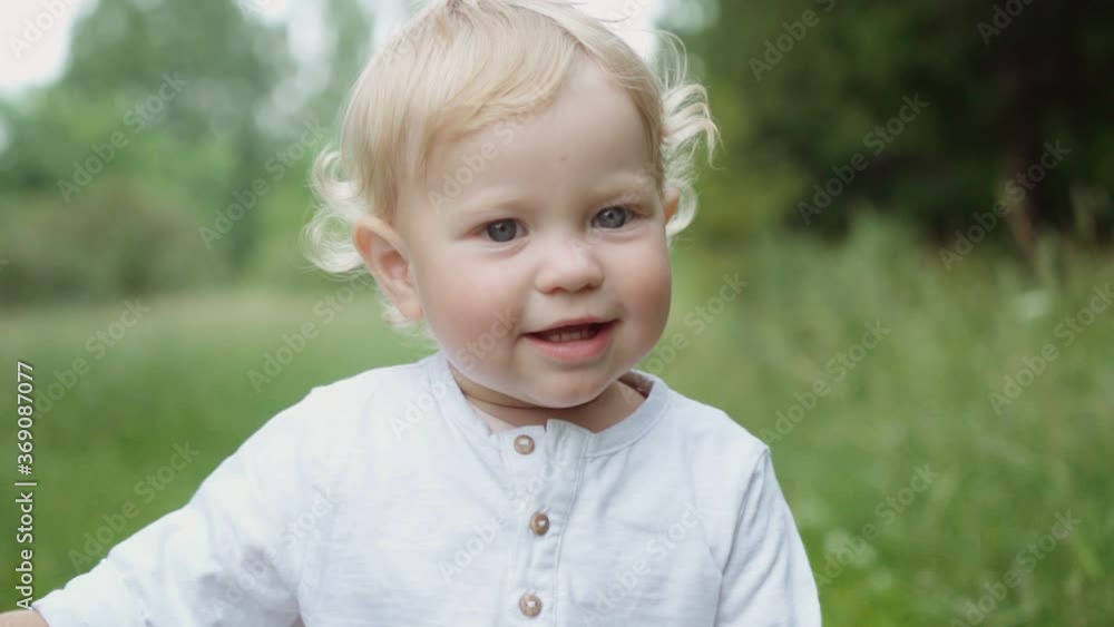 portrait of a child in the park. crying baby . parenting concept. childish tantrum and disobedience. portrait of a child in the park. crying baby . parenting concept. childish tantrum and disobedience.