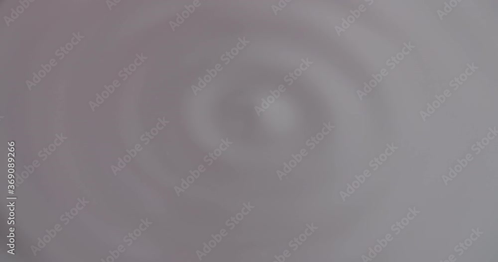 Water forming concentric waves and starting to vibrate. Macro shot of vibrating water. Water forming concentric waves and starting to vibrate. Macro shot of vibrating water.