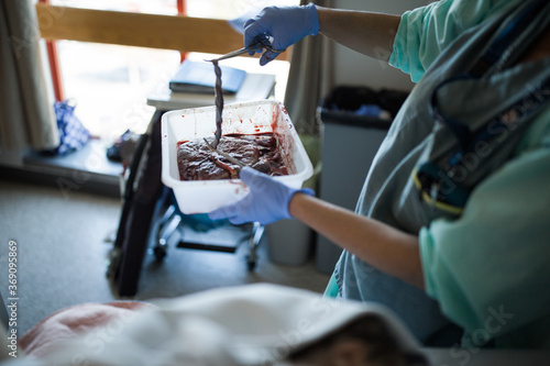 Midwife With A Placenta