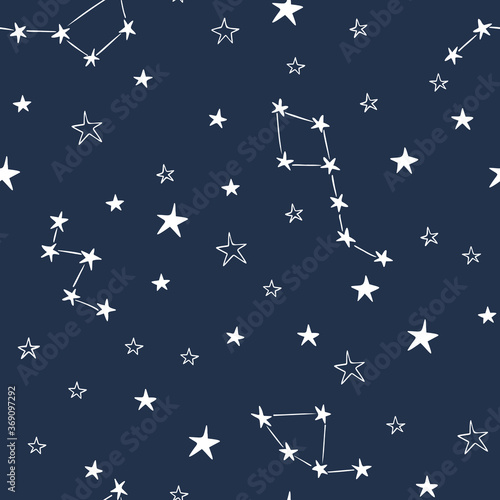 Stars constellations vector seamless pattern design hand-drawn on blue background. Space, universe, stars, ursa major, ursa minor, cassiopeia,  - fabric wrapping, textile, wallpaper, apparel design.