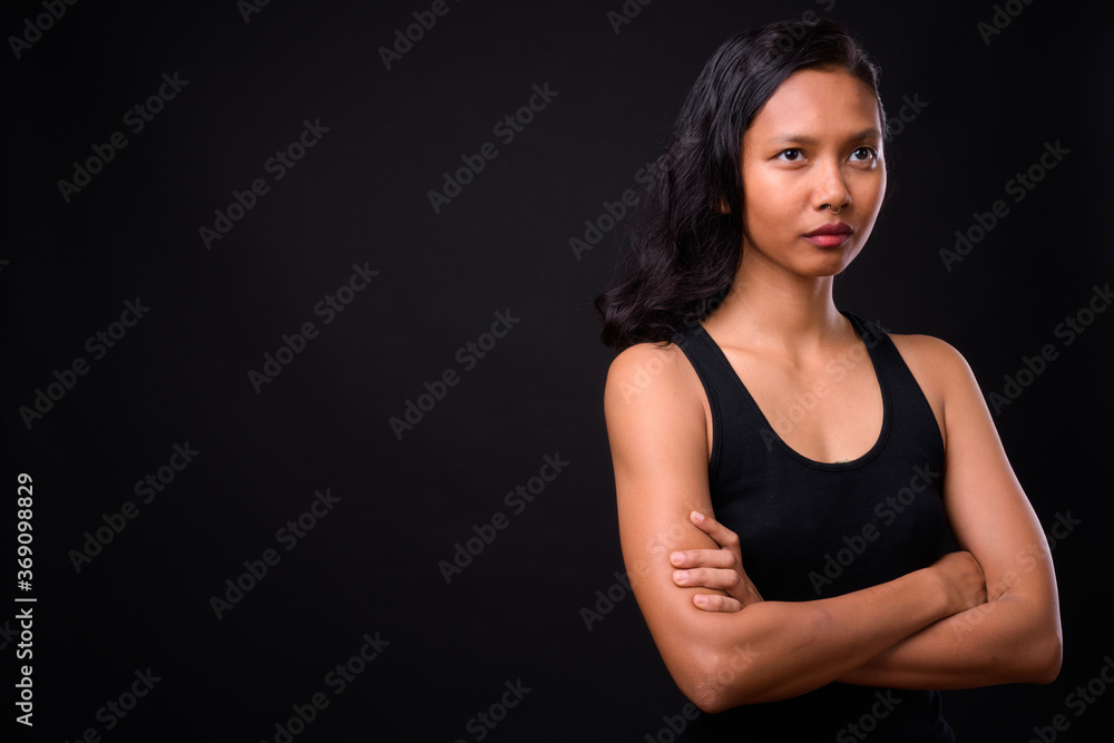 Portrait of young beautiful Asian woman with nose ring Portrait of young beautiful Asian woman with nose ring