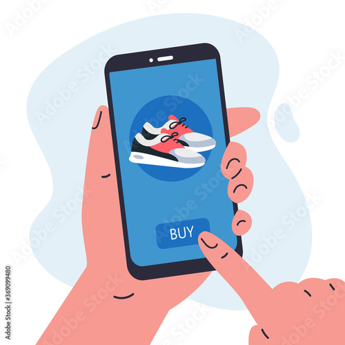Mobile shopping consept.Man holding a phone in her hands and shopping in the online store,buys a sneakers.Shopping on social networks through phone flat style.Online shopping vector illustration.