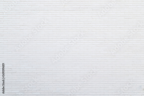 White new brick wall viewed from the front. High resolution full frame textured background. Copy space.