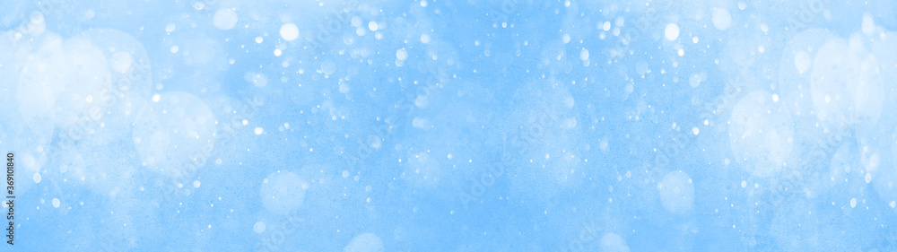 snowflakes isolated on blue sky - winter weather snow background panorama banner long	
