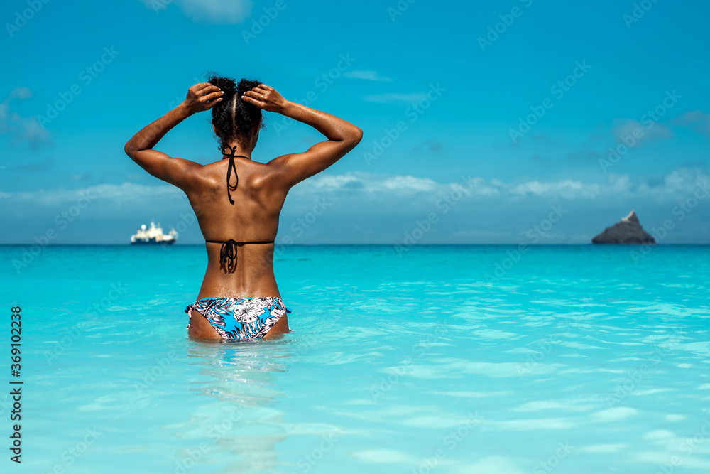Beautiful woman in a tropical beach island Beautiful woman in a tropical beach island
