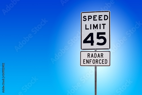 Speed Limit 45 Radar Enforced street sign