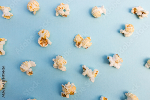 Popcorn on blue color background minimal food