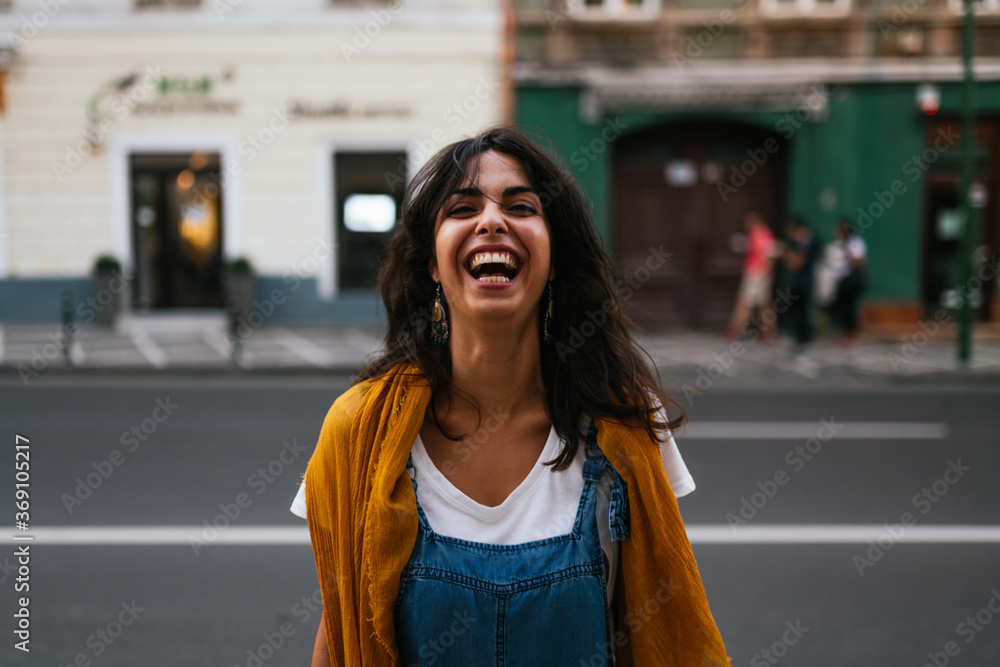 portrait of a Joyful and happy young woman laughing