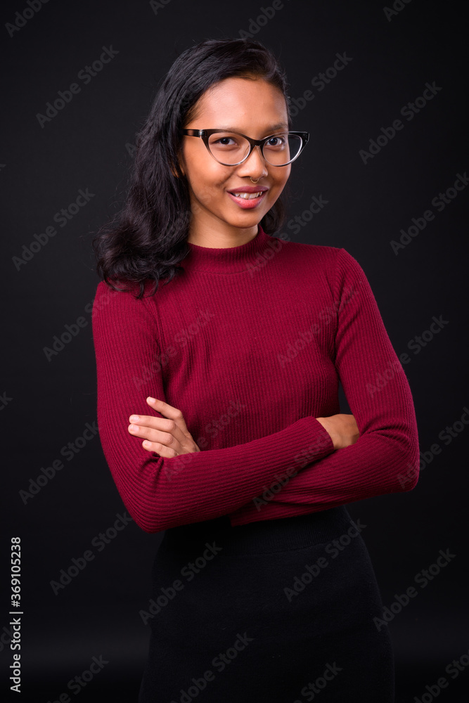 Obraz premium Portrait of happy young beautiful Asian businesswoman
