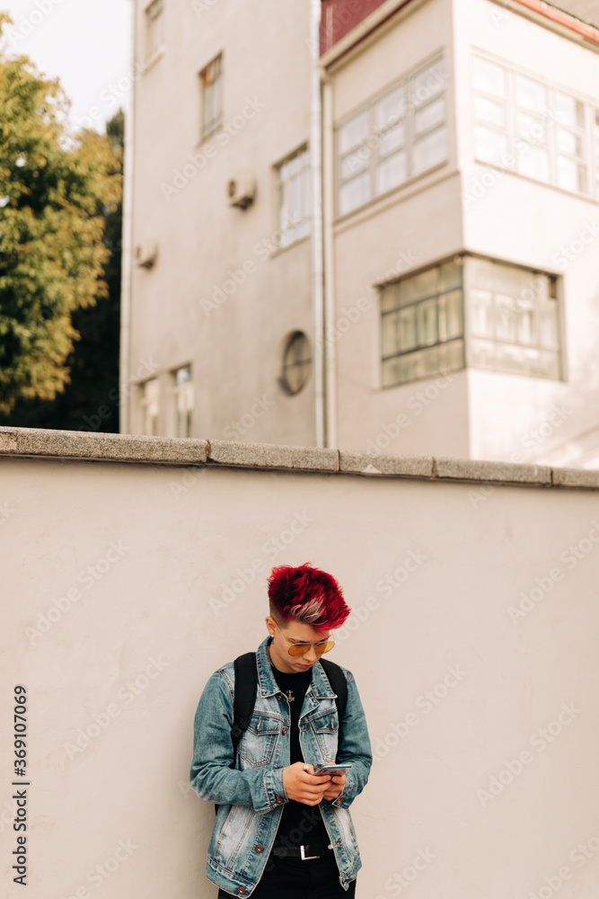 Real Lesbian Woman with red hairs using her phone Real Lesbian Woman with red hairs using her phone