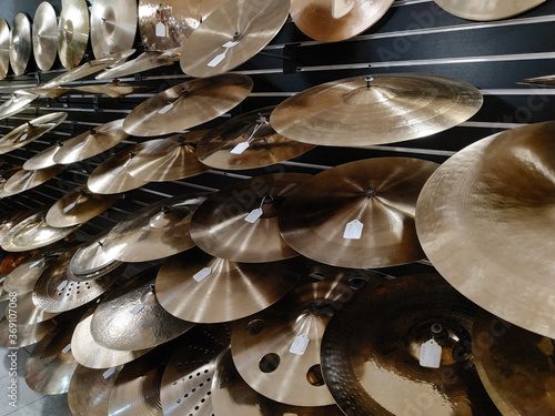 Various cymbals on display at music store photo