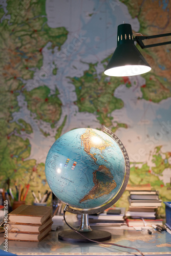 World map globe on a desk photo