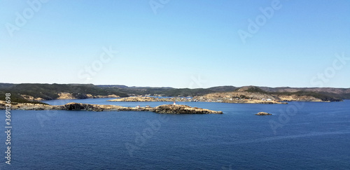 spring landscape with ocean and mountains