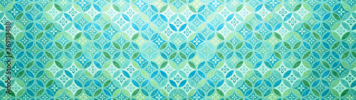 Old green turquoise blue aquamarine pastel vintage shabby patchwork mosaic motif tiles stone concrete cement wall texture background with circle print