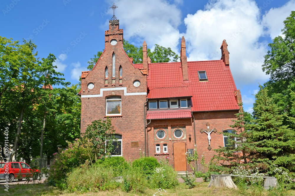 Facade of the house of the pastor of the Catholic Church Pillau (1910). Roman Catholic parish of the Blessed Name of the Virgin Mary. Baltiysk, Kaliningrad region Facade of the house of the pastor of the Catholic Church Pillau (1910). Roman Catholic parish of the Blessed Name of the Virgin Mary. Baltiysk, Kaliningrad region