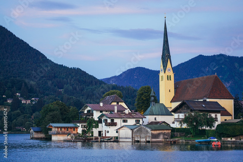 Church of Rottach-Egern in Bavaria at lake Tegernsee with mountains in the background