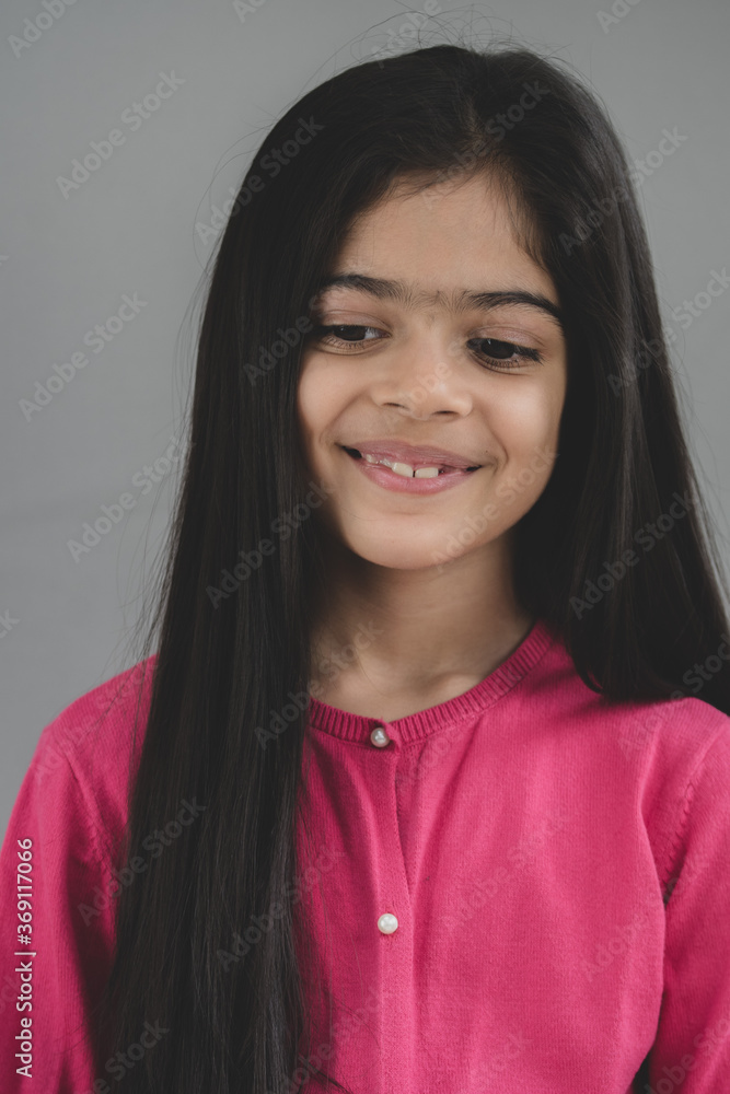 School age girl of British Indian descent displays different facial expressions. School age girl of British Indian descent displays different facial expressions.