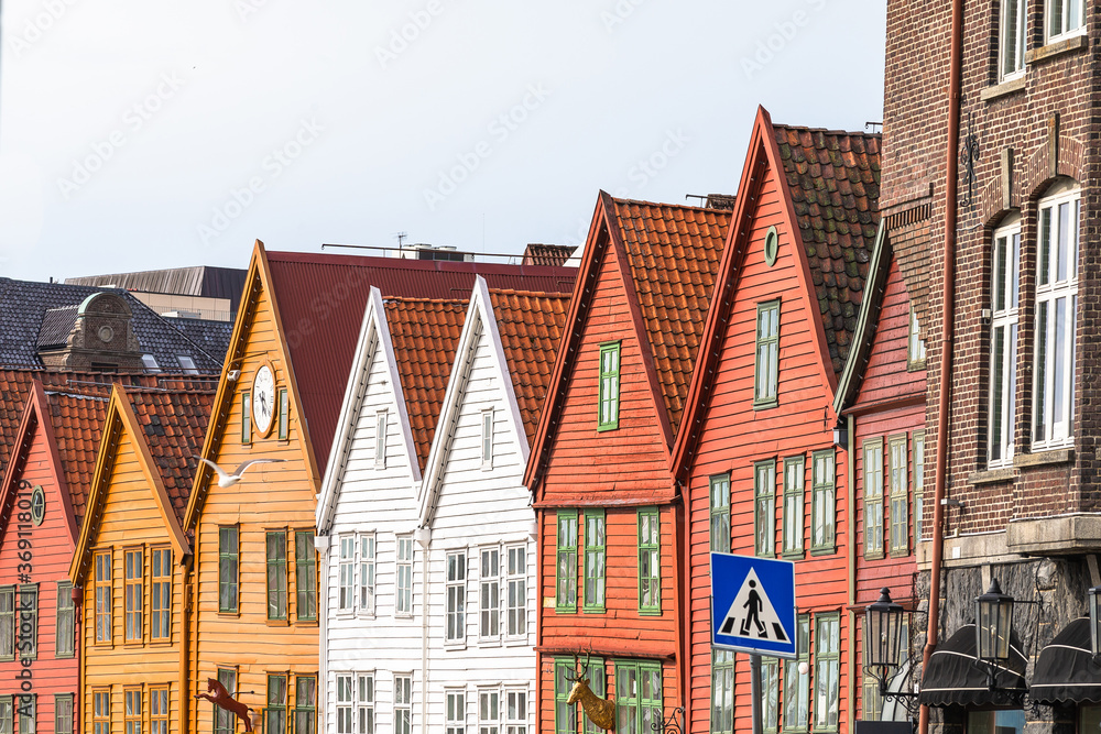 Famous Bryggen street with wooden colored houses in Bergen, Norway, UNESCO world heritage site.