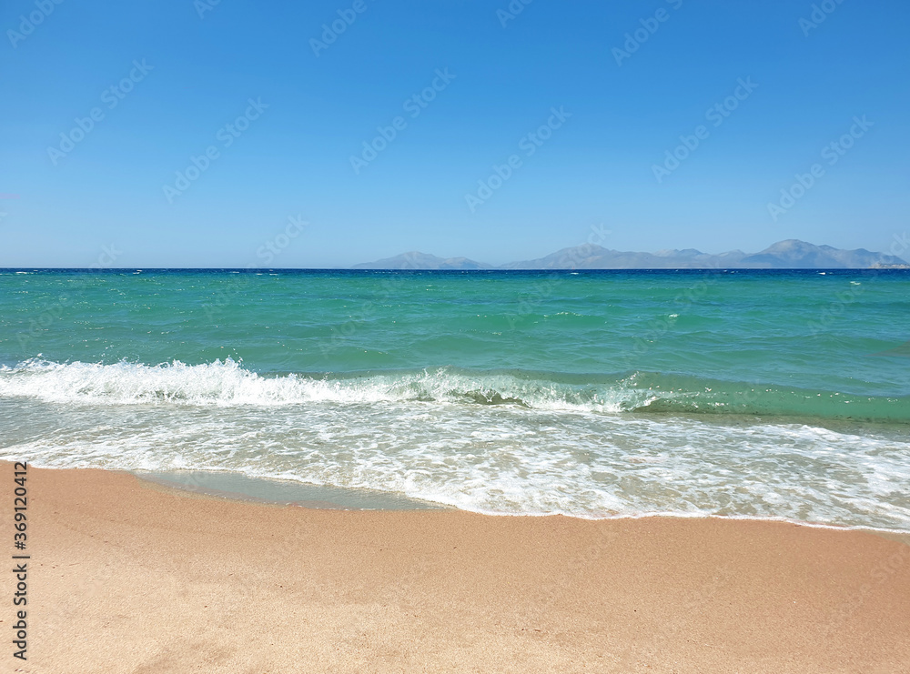Blue sea and beach background. Aqua sea water surface. Sea surface view. Beach view.