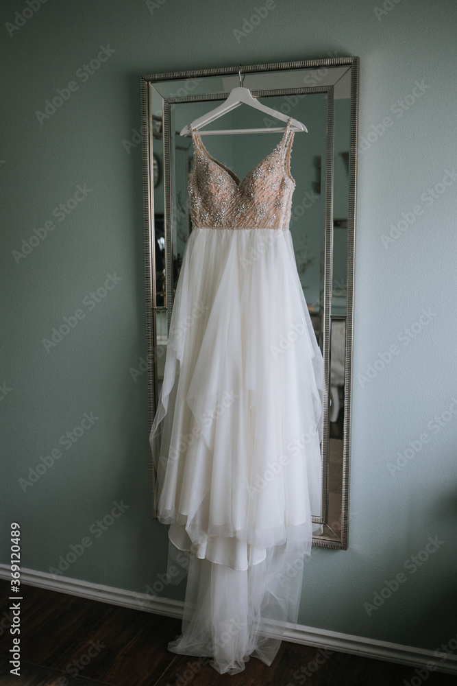 Wedding Dress Hanging in Bridal Suite Wedding Dress Hanging in Bridal Suite