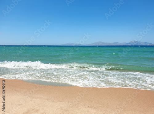 Blue sea and beach background. Aqua sea water surface. Sea surface view. Beach view.