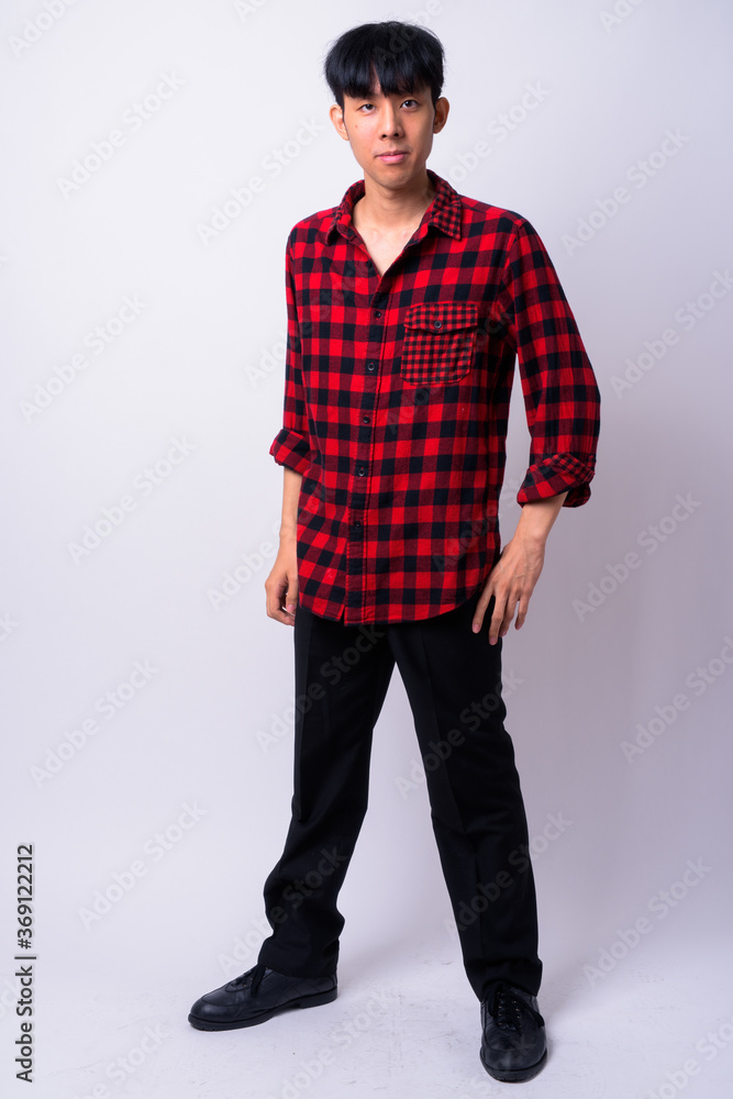 Portrait of young handsome Asian hipster man Portrait of young handsome Asian hipster man
